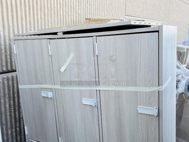 BRAND NEW SCRATCH & DENT! I.D. Systems 538023B45019 45" x 18" x 72" Natural Elm Triple Door Storage Locker with Middle Shelf. The base of the unit has broken off and the back bottom board has broken off. - Image 2 of 7