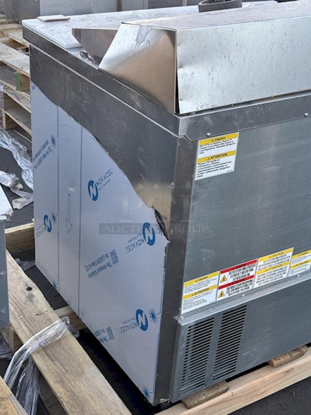 BRAND NEW SCRATCH-N-DENT! Beverage-Air SPE48HC-12 Elite Series 48" 2 Door Refrigerated Sandwich Prep Table. S/N: 15101948. Top is dented and (2) wheels are missing. - Image 4 of 8