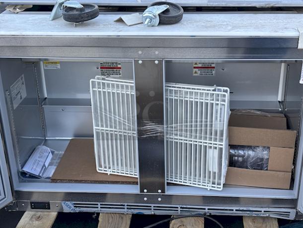 BRAND NEW SCRATCH-N-DENT! Beverage-Air SPE48HC-12 Elite Series 48" 2 Door Refrigerated Sandwich Prep Table. S/N: 15101948. Top is dented and (2) wheels are missing. - Image 5 of 8