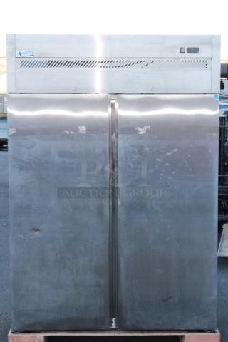 BRAND NEW SCRATCH & DENT!  Avantco Z2-F-HC 54" Solid Door Stainless Steel Reach-In Freezer. S/N: 925132805 7264 2402. 115 Volts	7.2 Amps	1 Phase	60 Hz. Missing Power Switch & Cord. Dented On The Back At The Base.