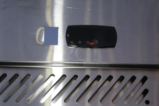 BRAND NEW SCRATCH & DENT!  Avantco Z2-F-HC 54" Solid Door Stainless Steel Reach-In Freezer. S/N: 925132805 7264 2402. 115 Volts	7.2 Amps	1 Phase	60 Hz. Missing Power Switch & Cord. Dented On The Back At The Base. - Image 6 of 11
