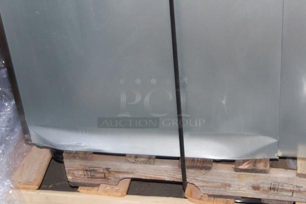 BRAND NEW SCRATCH & DENT!  Avantco Z2-F-HC 54" Solid Door Stainless Steel Reach-In Freezer. S/N: 925132805 7264 2402. 115 Volts	7.2 Amps	1 Phase	60 Hz. Missing Power Switch & Cord. Dented On The Back At The Base. - Image 8 of 11