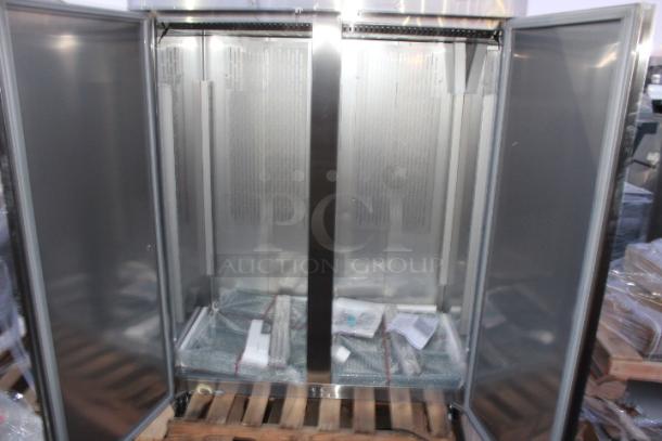 BRAND NEW SCRATCH & DENT!  Avantco Z2-F-HC 54" Solid Door Stainless Steel Reach-In Freezer. S/N: 925132805 7264 2402. 115 Volts	7.2 Amps	1 Phase	60 Hz. Missing Power Switch & Cord. Dented On The Back At The Base. - Image 10 of 11