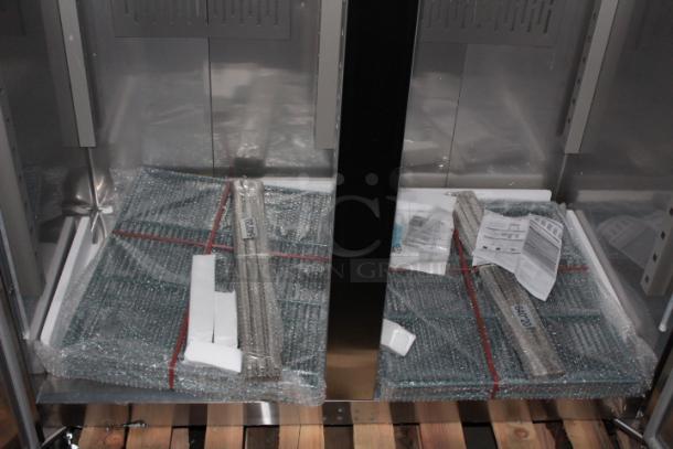 BRAND NEW SCRATCH & DENT!  Avantco Z2-F-HC 54" Solid Door Stainless Steel Reach-In Freezer. S/N: 925132805 7264 2402. 115 Volts	7.2 Amps	1 Phase	60 Hz. Missing Power Switch & Cord. Dented On The Back At The Base. - Image 11 of 11