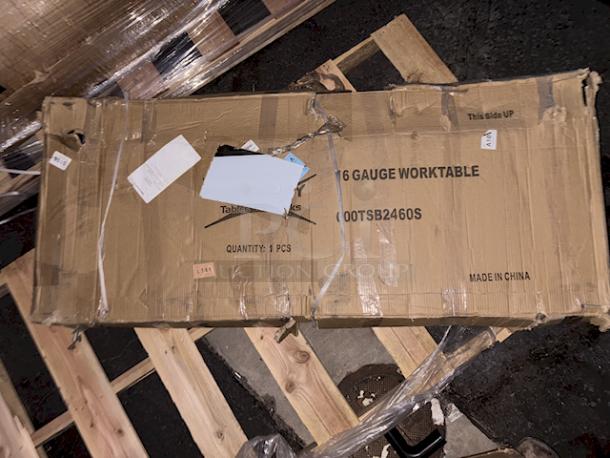 BRAND NEW SCRATCH & DENT! Regency 600TSB2460S 24" x 60" 16-Gauge Stainless Steel Commercial Work Table with 4" Backsplash and Undershelf. In original box. - Image 1 of 1