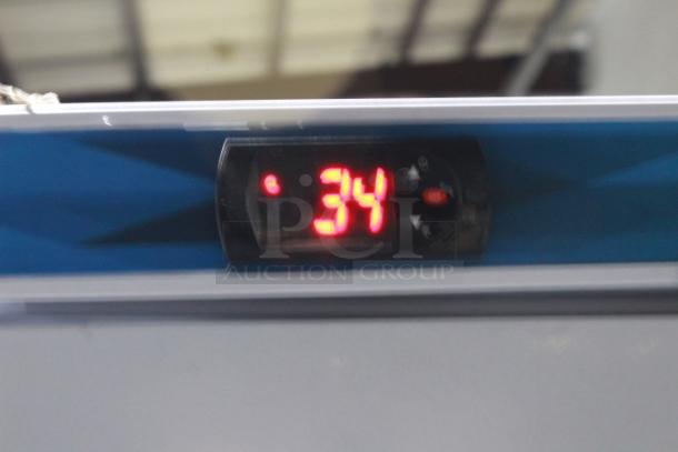 BRAND NEW SCRATCH & DENT! IN PERFECT WORKING ORDER!! Koolmore KM-FMD20WH 21 Cu. ft. Commercial Reach-in Freezer in White Manual Defrost, 115v. 27.4" x 30.1" x 74.4" 
Base and top of unit are dented. See Photos. TESTED! WORKS PERFECT!
*This unit is located at our main warehouse approximately 10mins away. The address is 3290 S. Highland Dr. Las Vegas NV 89109.* - Image 6 of 11