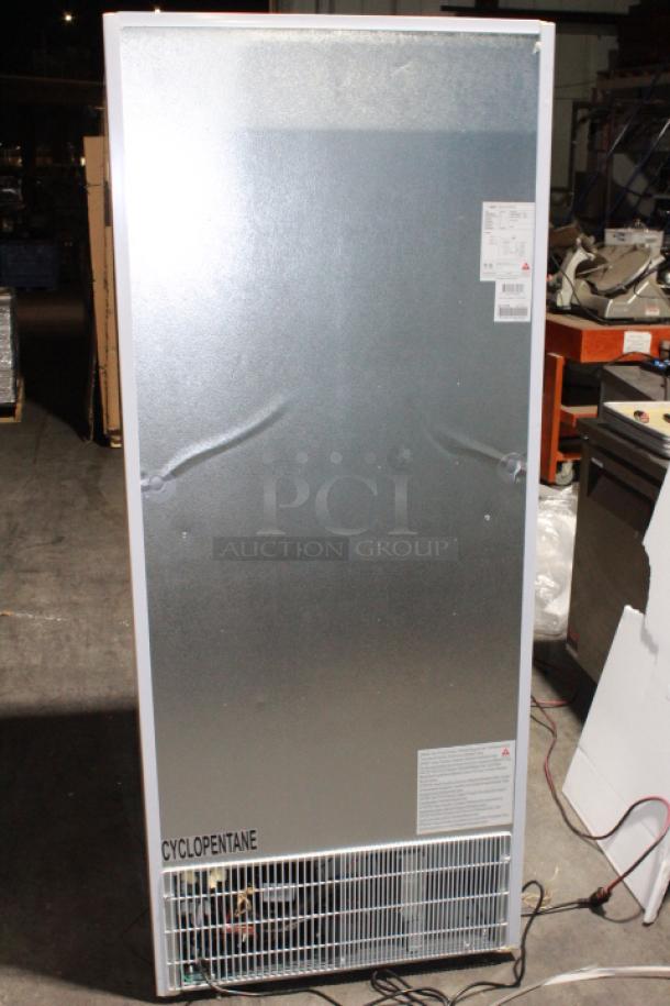 BRAND NEW SCRATCH & DENT! IN PERFECT WORKING ORDER!! Koolmore KM-FMD20WH 21 Cu. ft. Commercial Reach-in Freezer in White Manual Defrost, 115v. 27.4" x 30.1" x 74.4" 
Base and top of unit are dented. See Photos. TESTED! WORKS PERFECT!
*This unit is located at our main warehouse approximately 10mins away. The address is 3290 S. Highland Dr. Las Vegas NV 89109.* - Image 8 of 11
