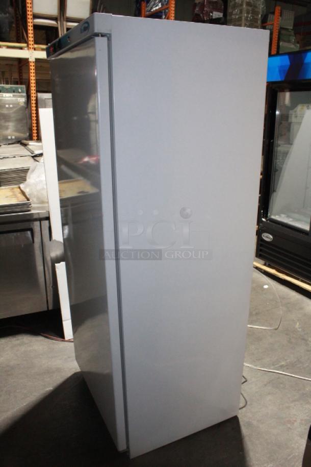BRAND NEW SCRATCH & DENT! IN PERFECT WORKING ORDER!! Koolmore KM-FMD20WH 21 Cu. ft. Commercial Reach-in Freezer in White Manual Defrost, 115v. 27.4" x 30.1" x 74.4" 
Base and top of unit are dented. See Photos. TESTED! WORKS PERFECT!
*This unit is located at our main warehouse approximately 10mins away. The address is 3290 S. Highland Dr. Las Vegas NV 89109.* - Image 11 of 11