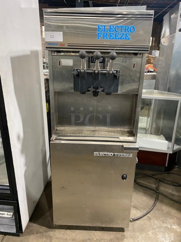 Electro Freeze Freedom 360 Series Commercial Stainless Steel Air-Cooled Dual Flavor Twist Soft Serve Ice Cream/Frozen Yogurt Machine! With 2 Hoppers & 3 Dispensers! Model: 88TN-CMT-213 SN: A2F105! 230V 1 Phase! On Legs! - Image 1 of 12