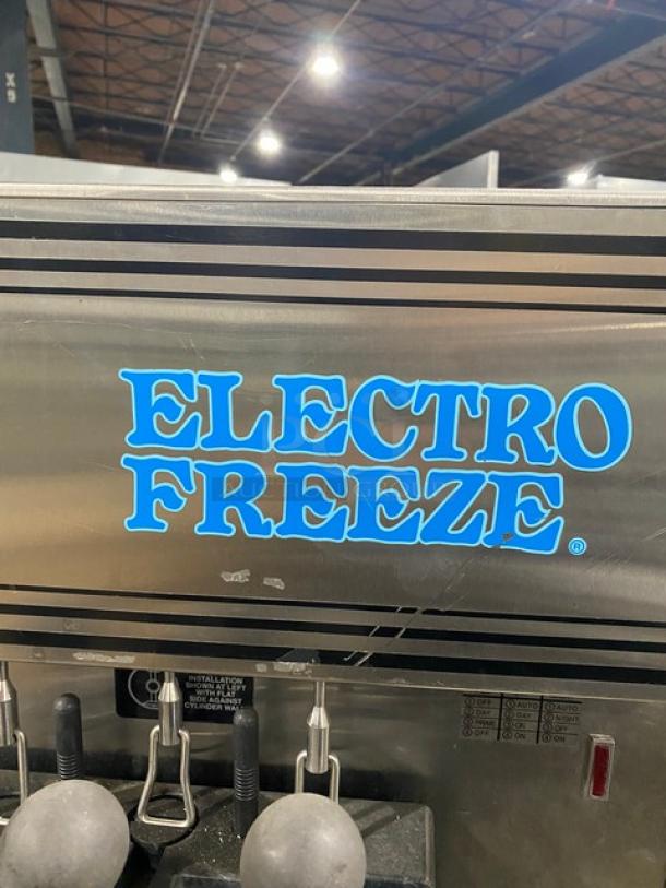 Electro Freeze Freedom 360 Series Commercial Stainless Steel Air-Cooled Dual Flavor Twist Soft Serve Ice Cream/Frozen Yogurt Machine! With 2 Hoppers & 3 Dispensers! Model: 88TN-CMT-213 SN: A2F105! 230V 1 Phase! On Legs! - Image 9 of 12