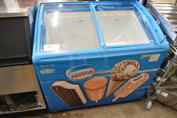 AHT RIO S 100 Metal Commercial Chest Freezer Merchandiser on Commercial Casters. 120 Volts, 1 Phase. Tested and Working! - Image 1 of 9