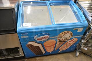 AHT RIO S 100 Metal Commercial Chest Freezer Merchandiser on Commercial Casters. 120 Volts, 1 Phase. Tested and Working!