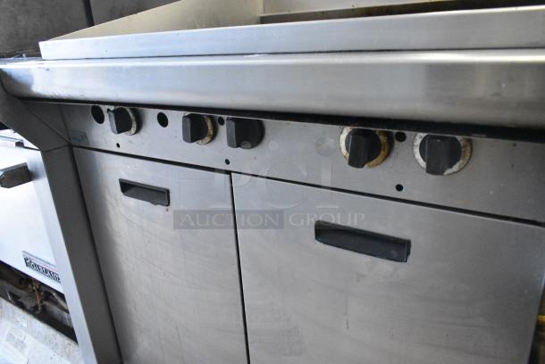 Garland M34B Stainless Steel Commercial  Natural Gas Powered Charbroiler Grill w/ Back Splash, 2 Doors and Under Shelf. - Image 4 of 8