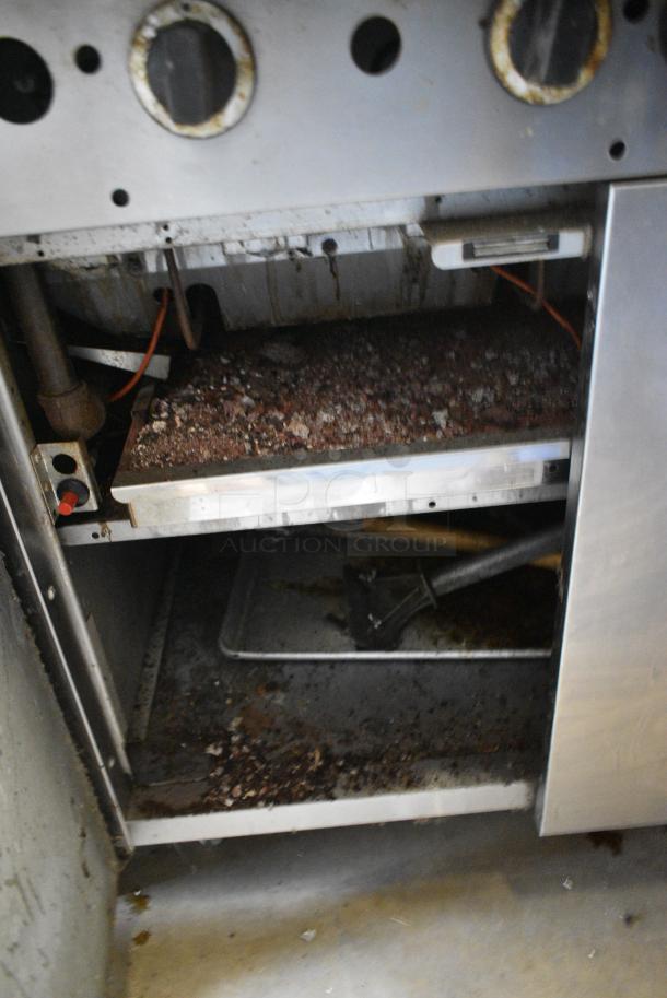 Garland M34B Stainless Steel Commercial  Natural Gas Powered Charbroiler Grill w/ Back Splash, 2 Doors and Under Shelf. - Image 5 of 8