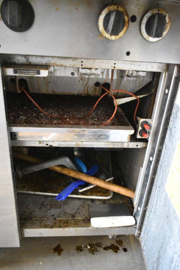 Garland M34B Stainless Steel Commercial  Natural Gas Powered Charbroiler Grill w/ Back Splash, 2 Doors and Under Shelf. - Image 6 of 8