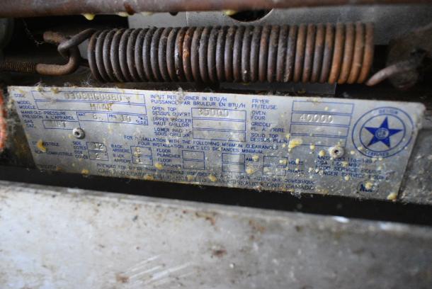 Garland M44R Stainless Steel Commercial Natural Gas Powered 4 Burner Range w/ Oven, Back Splash and Over Shelf. 40,000 BTU. - Image 6 of 6