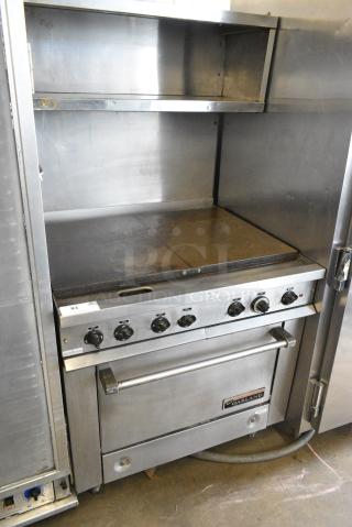 Garland Stainless Steel Commercial Electric Powered Flat Top Griddle w/ Oven, Over Shelf and Back Splash. 240 Volts, 3 Phase.
