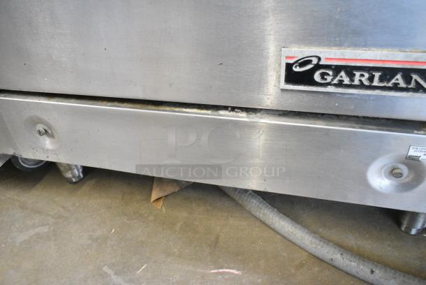 Garland Stainless Steel Commercial Electric Powered Flat Top Griddle w/ Oven, Over Shelf and Back Splash. 240 Volts, 3 Phase. - Image 6 of 6