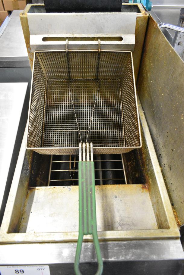 Stainless Steel Commercial Floor Style Natural Gas Powered Deep Fat Fryer w/ Metal Fry Basket and Side Splash Guard. - Image 2 of 5