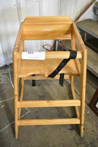 Wooden High Chair.