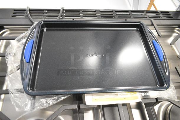 BRAND NEW SCRATCH AND DENT! Box of Nutrichef NCBK3S 3-Piece Nonstick Baking Pans Set - Premium Oven Bakeware with Silicone Handles, Non-Stick Heavy Duty Carbon Steel - Stackable & Easy to Clean, Ideal for Roasting & Baking - Blue - Image 4 of 6