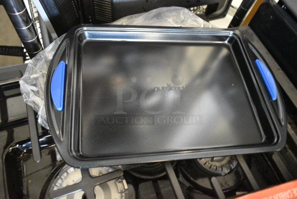 BRAND NEW SCRATCH AND DENT! Box of Nutrichef NCBK3S 3-Piece Nonstick Baking Pans Set - Premium Oven Bakeware with Silicone Handles, Non-Stick Heavy Duty Carbon Steel - Stackable & Easy to Clean, Ideal for Roasting & Baking - Blue - Image 5 of 6