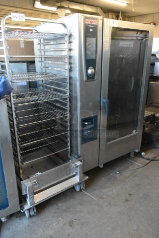 Rational SCC WE 202G Stainless Steel Commercial Natural Gas Powered Roll In Combi Convection Oven w/ Metal Transport Rack for Roll In Combi Convection Oven on Commercial Casters.