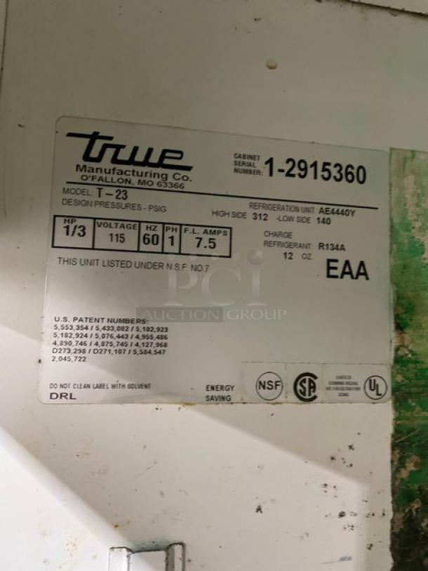 True Commercial Stainless Steel Solid Single Swing Door Reach In Refrigerator! With Poly Coated Wire Racks! Model: T-23 SN: 1-2915360! 115V 1 Phase! On Casters! - Image 6 of 9