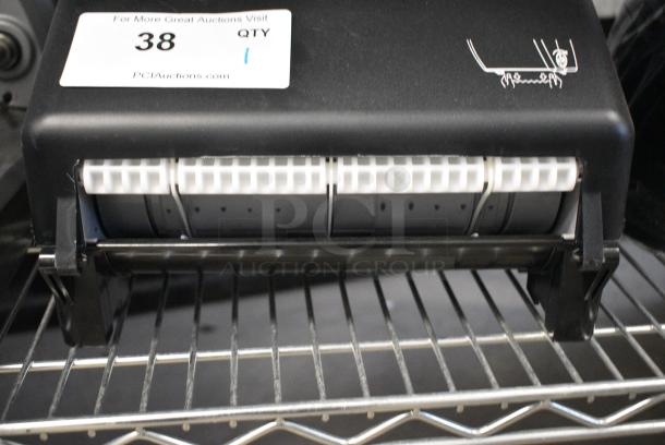 BRAND NEW SCRATCH AND DENT! Lavex 712RTAUTOCUT Translucent Black Auto-Cut Hands Free Paper Towel Dispenser - Image 3 of 4