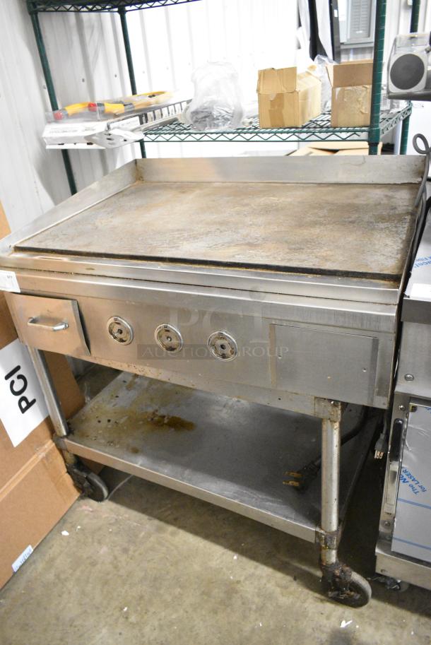 Stainless Steel Commercial Electric Powered Flat Top Griddle w/ Metal Under Shelf on Commercial Casters. 208/240 Volts, 3 Phase. - Image 1 of 5