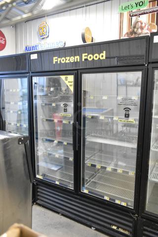 True GDM-49F-HC Metal Commercial 2 Door Reach In Freezer Merchandiser w/ Poly Coated Racks. 115/208-230 Volts, 1 Phase. Tested and Working!