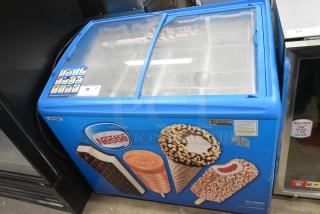 AHT Metal Commercial Chest Freezer Merchandiser on Commercial Casters. 115 Volts, 1 Phase. Tested and Working!