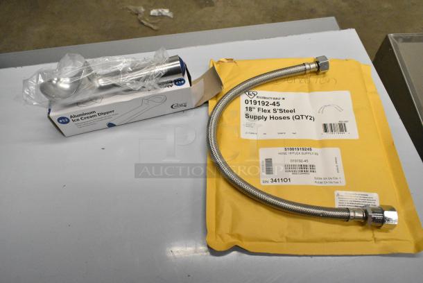 7 BRAND NEW SCRATCH AND DENT! Items Including 51001919245 T&S 019192-45 18" Flexible Stainless Steel Supply Hose with 1/2" NPSM Male Inlets, 407AD12 Choice #16 Aluminum Green Ice Cream Scoop / Dipper - 2.5 oz., 169HS1201S Henry Segal Men's Customizable Black Long Sleeve Band Collar Dress Shirt - S, 607BA2-BK Chef Revival Black Poly-Cotton Customizable Bistro Apron with 2 Pockets - 34" x 28", Chef Revival White Poly-Cotton Customizable Bistro Apron with 2 Pockets - 34" x 28", Metal Colander. 7 Times Your Bid! - Image 2 of 10