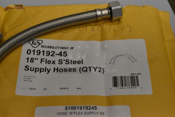 7 BRAND NEW SCRATCH AND DENT! Items Including 51001919245 T&S 019192-45 18" Flexible Stainless Steel Supply Hose with 1/2" NPSM Male Inlets, 407AD12 Choice #16 Aluminum Green Ice Cream Scoop / Dipper - 2.5 oz., 169HS1201S Henry Segal Men's Customizable Black Long Sleeve Band Collar Dress Shirt - S, 607BA2-BK Chef Revival Black Poly-Cotton Customizable Bistro Apron with 2 Pockets - 34" x 28", Chef Revival White Poly-Cotton Customizable Bistro Apron with 2 Pockets - 34" x 28", Metal Colander. 7 Times Your Bid! - Image 3 of 10