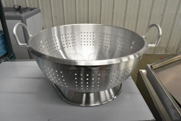 7 BRAND NEW SCRATCH AND DENT! Items Including 51001919245 T&S 019192-45 18" Flexible Stainless Steel Supply Hose with 1/2" NPSM Male Inlets, 407AD12 Choice #16 Aluminum Green Ice Cream Scoop / Dipper - 2.5 oz., 169HS1201S Henry Segal Men's Customizable Black Long Sleeve Band Collar Dress Shirt - S, 607BA2-BK Chef Revival Black Poly-Cotton Customizable Bistro Apron with 2 Pockets - 34" x 28", Chef Revival White Poly-Cotton Customizable Bistro Apron with 2 Pockets - 34" x 28", Metal Colander. 7 Times Your Bid! - Image 9 of 10