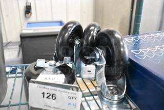 BRAND NEW SCRATCH AND DENT! Lot of 4 351901537L Commercial Casters.