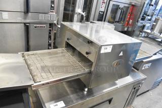 BRAND NEW SCRATCH AND DENT! Cooking Performance Group CPG 351ICOED Stainless Steel Commercial Countertop Electric Powered Conveyor Pizza Oven. 240 Volts, 3 Phase.