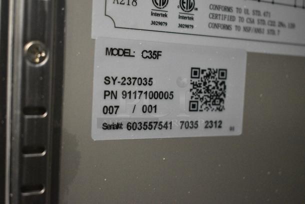 BRAND NEW! 2023 Coldline C35F Stainless Steel Commercial 2 Door Reach In Freezer w/ Poly Coated Racks on Commercial Casters. 115 Volts, 1 Phase. Tested and Working! - Image 7 of 7