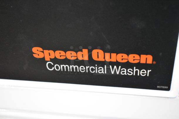 BRAND NEW SCRATCH AND DENT! 2024 Speed Queen Alliance SFNNCASP116TW01 Quantum Gold Pro FV6010WN 3.42 cu. ft. 27" Front Load Commercial Washer with Front Control - Coin Operated - Image 2 of 8