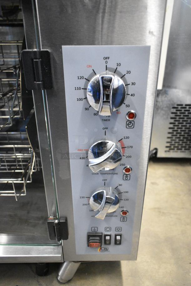 BRAND NEW SCRATCH AND DENT! Cooking Performance Group CPG 351CROE415D Stainless Steel Electric Countertop Rotisserie Oven with 5 Baskets for 15 Chickens. 240 Volts, 1 Phase. - Image 2 of 8