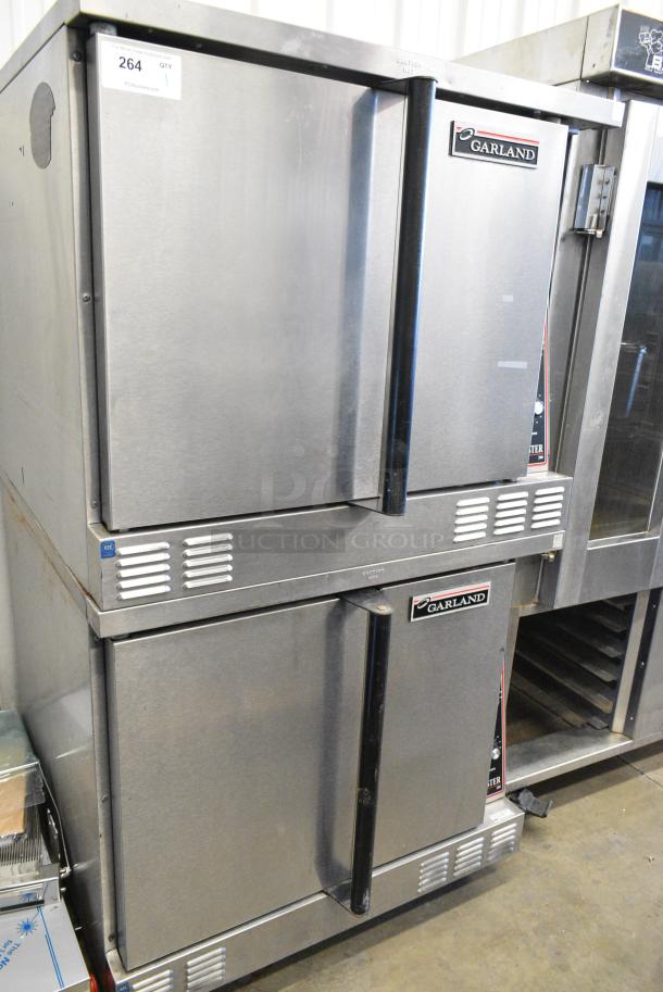 2 Garland Master 200 Stainless Steel Commercial  Electric Powered Full Size Convection Oven w/ Solid Doors, Metal Oven Racks and Thermostatic Controls on Commercial Casters. 240/480 Volts, 3 Phase.  2 Times Your Bid! - Image 1 of 7