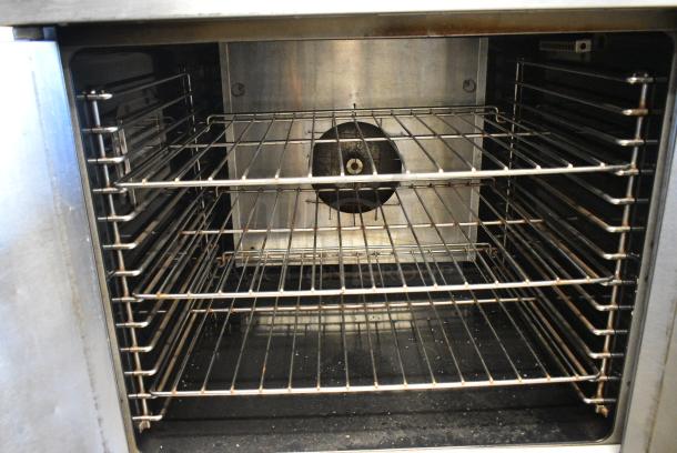 2 Garland Master 200 Stainless Steel Commercial  Electric Powered Full Size Convection Oven w/ Solid Doors, Metal Oven Racks and Thermostatic Controls on Commercial Casters. 240/480 Volts, 3 Phase.  2 Times Your Bid! - Image 6 of 7