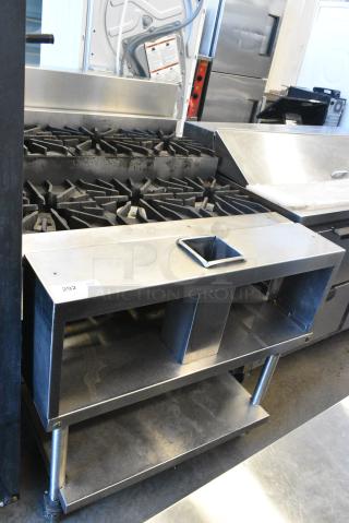 Stainless Steel Commercial Natural Gas Powered 6 Burner 2 Tier Range w/ Under Shelf on Commercial Casters.