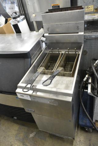 Pitco Frialator Stainless Steel Commercial Floor Style Natural Gas Powered Deep Fat Fryer w/ 2 Metal Fry Baskets. 122,000 BTU.