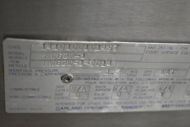 Garland GWG2W-1 Stainless Steel Commercial Natural Gas Powered Clamshell Panini Press Flat Top Griddle on Commercial Casters. - Image 9 of 10