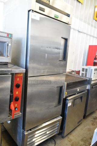 True T-23F-2-MC Stainless Steel Commercial 2 Half Size Door Reach In Freezer on Commercial Casters. 115 Volts, 1 Phase. Tested and Powers On But Does Not Get Cold