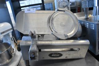 Globe 500L Stainless Steel Commercial Countertop Meat Slicer w/ Blade Sharpener. 115 Volts, 1 Phase. Missing 2 Legs. Tested and Working!