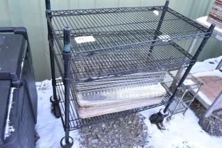 Black Finish 3 Tier Wire Shelving Unit on Commercial Casters. BUYER MUST DISMANTLE. PCI CANNOT DISMANTLE FOR SHIPPING. PLEASE CONSIDER FREIGHT CHARGES.