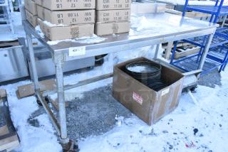 Stainless Steel Table on Commercial Casters.