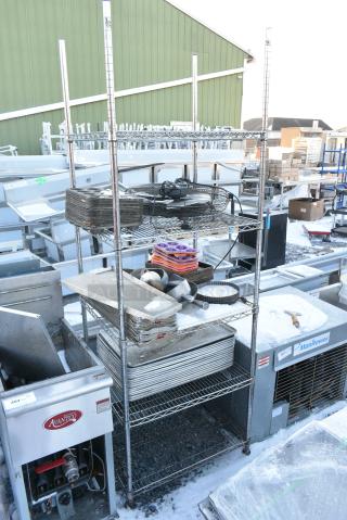 Chrome Finish 5 Tier Wire Shelving Unit on w/ Contents Including Metal Baking Pans and Fan. BUYER MUST DISMANTLE. PCI CANNOT DISMANTLE FOR SHIPPING. PLEASE CONSIDER FREIGHT CHARGES.